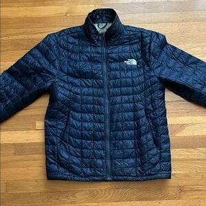 The North Face navy blue puffer. Men’s size Small. Good used condition. $40